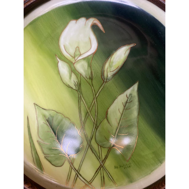 There is lovely depth and detail in this floral, perfectly anchored by the solid dark brown wood frame which has the...