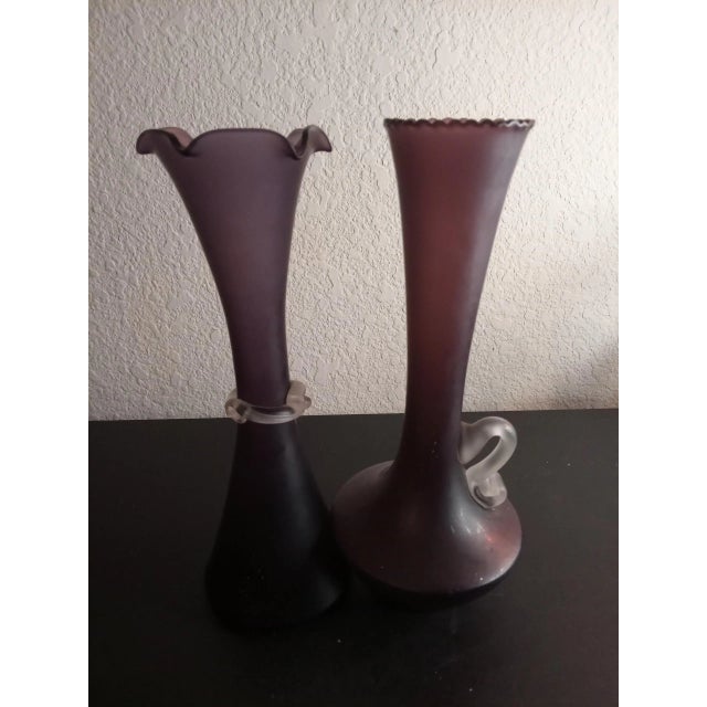 These are Amethyst Art Glass 8" Vases with rigaree & applied handle Set of 2 Procured at auction