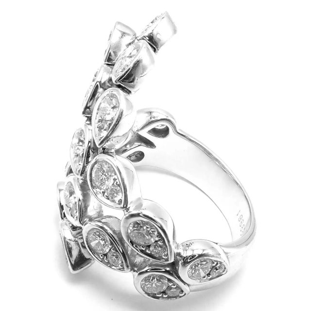 18k White Gold Diamond Flexible Magic Ring by Piaget. Details: Ring Size: European 53, US 6.25 Weight: 11.6 grams Width:...