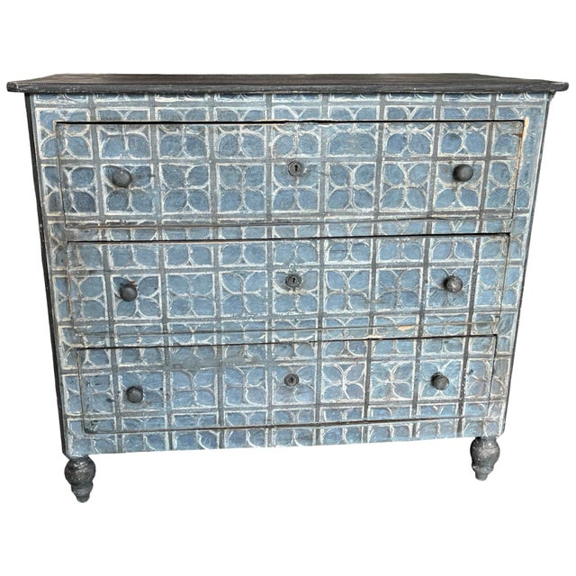 Chest of drawers hand-made in central Italy in the early 1800s using walnut. The chest is very simple and linear but is...