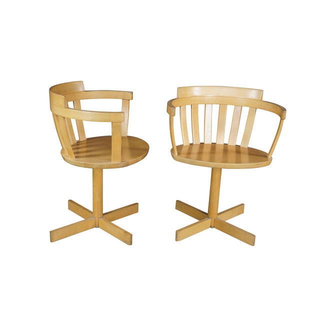 Set of 4 Swedish Modern swivel arm chairs by Sune Fromell & Jan Hallberg for Edsby Verken, circa 1960s. Features a birch...