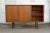 This rare highboard has a trapezoidal body. It was made by Bramin in the 1960s. The surrounding frame, as well as the...