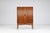 Danish high cabinet in teak with tambour doors, Denmark 1960s. An elegant Scandinavian modern cabinet characterized by its...