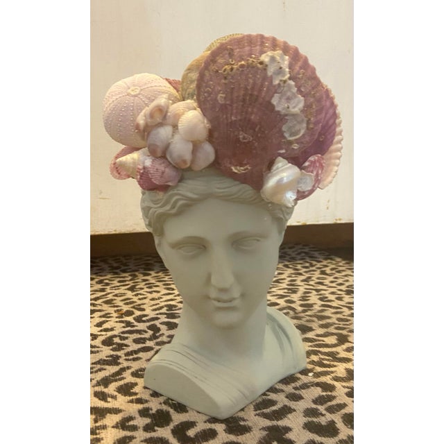 Shell-Encrusted Female Bust in Farrow & Ball Blue Gray #91 with hidden candle holders. By May River Neptune. A singular...