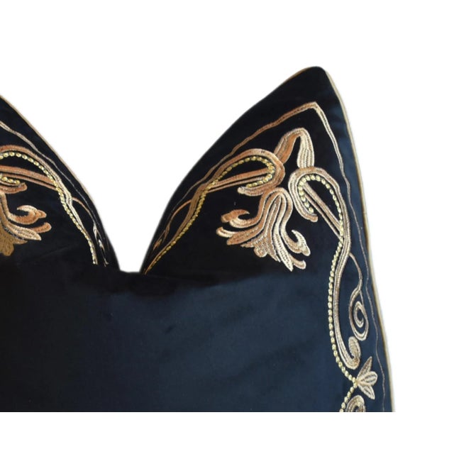Custom-tailored designer pillow in a gold embroidered black cotton-velvet fabric depicting a beautiful floral botanical...