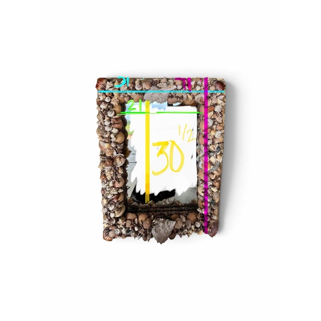 This is an early handmade American seashell mirror dating to the 1960s and an example not frequently encountered. The...