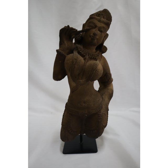 Exquisite antique sandstone statue of a Hindu Surasundari or Apsara figure. Surasundari are young maidens who embody...