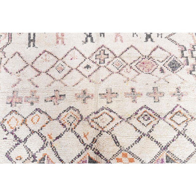 Moroccan Vintage Rug – Intricate Tribal Geometry and Soft Pastel Palette Size: 5'7" × 12'1" (170 × 368 cm) This...