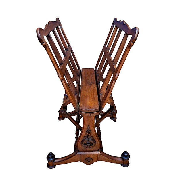 This striking piece of antique furniture is an adjustable folio stand—also known as a Canterbury, a print stand, or a...
