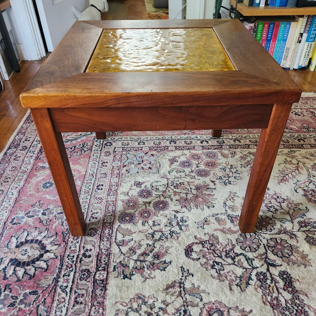 One beautiful Mid-Century Modern side table attributed to John Keal for Brown Saltman of California. The table is unmarked...