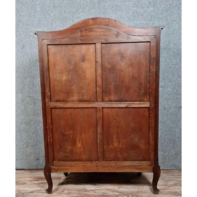 Louis xv style curved bookcase in solid walnut, circa 1880-1900 front with two paneled and glazed doors sides also glazed...