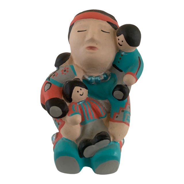 Vintage Southwest Heritage Native American Pottery Art Storyteller Figure Holding Three Children. Created and Signed 1992. For Sale