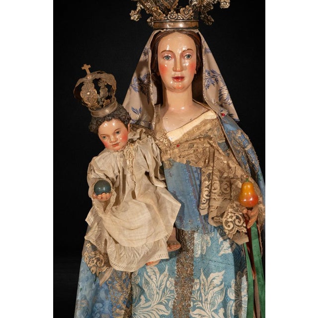 A striking and highly decorative Spanish Baroque Virgin and Child figure, probably dating from the late 17th or early 18th...