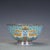 This exquisite set of six porcelain bowls comes presented in a custom-fitted wooden box with a pierced decorative lid....