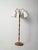 Mid-century floor lamp in turned teak and brass with three adjustable arms and adjustable heads. Elegant Scandinavian...