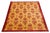 This contemporary handmade rug is crafted from Paki wool and features a golden field adorned with red accents throughout...