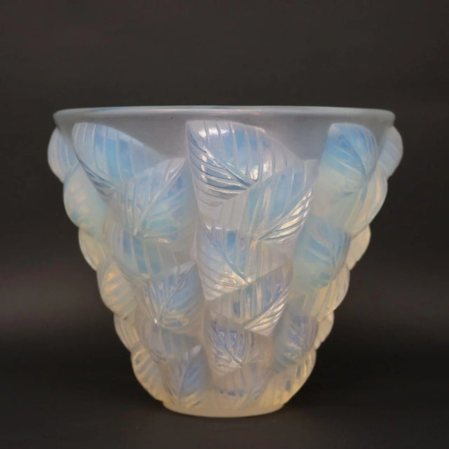 Rene Lalique Opalescent Glass 'Moissac' Vase. This pattern features deeply embossed leaves around the sides. Wheel cut...