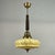 This art deco pendant was manufactured and designed in germany in the 1930s. The light features an elegant marbled glass...