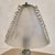 A petite Italian Murano glass table lamp from the 1940s, crafted in the Art Deco era. The compact form features a pulegoso...