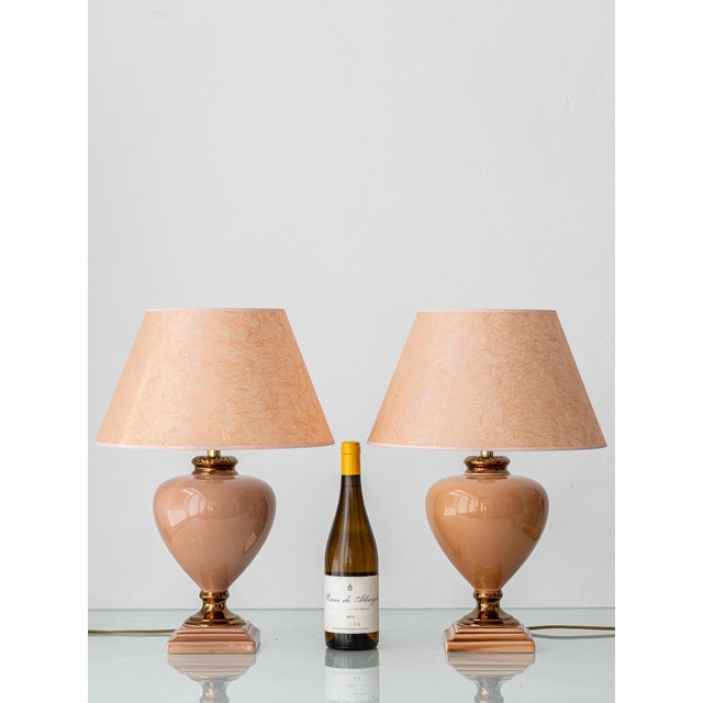 Hollywood Regency style. Pair of French ceramic urn table lamps by Louis Drimmer, Onet-le-Château, France, 1980s. The...
