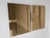 Pair of Andromeda mirrors designed by Nanda Vigo in 1974 and produced by Glas Italia. Executed in amber-tinted mirrored...