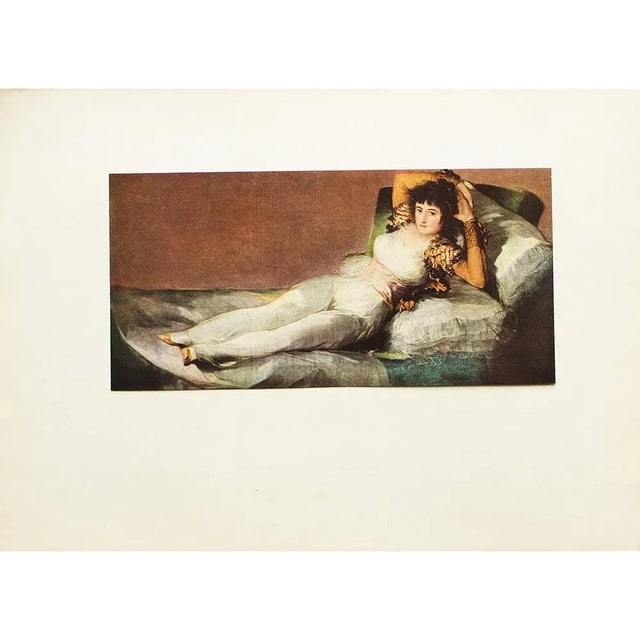 A First Edition full-color print of painting "The Maja Clothed" by Francisco Goya. Comes from a First Limited Edition art...