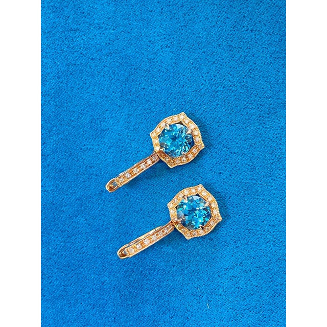 Contemporary Round Brilliant Cut Blue Topaz Diamond Halo 14 Karat Rose Gold Huggie Drop State, A Pair For Sale - Image 3 of 9
