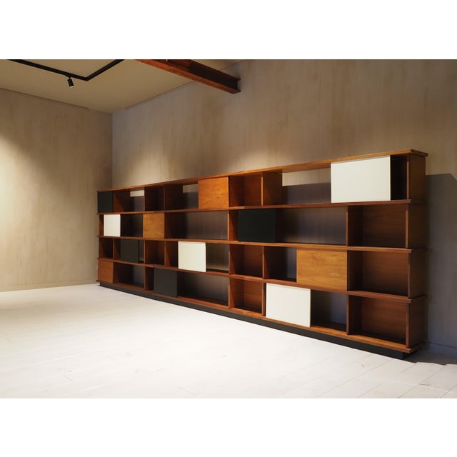 This monumental bookshelf "Pala" or "Palan" is by Finnish designer Ilmari Tapiovaara (1914-1999) for Asko, Finland 1950's....
