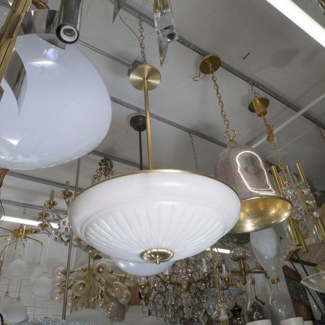 Alabaster and brass pendant