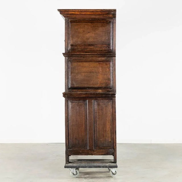 An impressive early 18th century Dutch oak geometric kussen cabinet with integral secretaire Anonymous Belgium or...