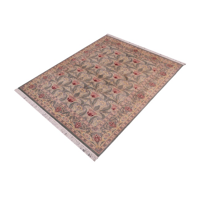 Designed with mesmerizing intricacy and gorgeous color palette, this hand-knotted masterpiece demonstrates the beauty and...