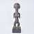 The Luba female figure is crafted as a veneration of feminine beauty and motherhood. Crafted from wood, the Luba female...