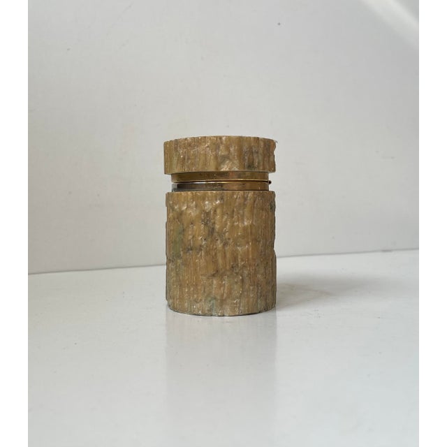 Decorative natural light brown and blue alabaster stone trinket, jewelry or cigarette box. Tree trunk design - form. Hand-...