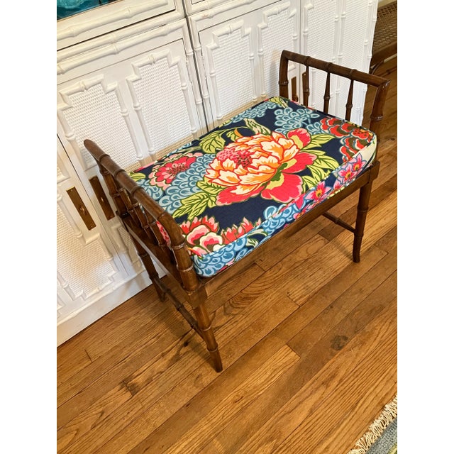 Vintage Faux bamboo bench with new Thibaut navy Honshu fabric. Great condition. Sturdy with some minor discoloration in...