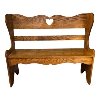 Vintage Early American Primitive Oak Bench With a Heart Carved in the Backrest For Sale