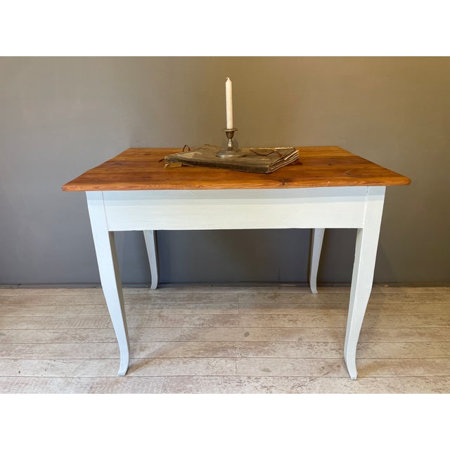We've given this charming antique table a fresh coat of paint, sanded the surface, and oiled it. Width: 98.5 cm Depth: 69...