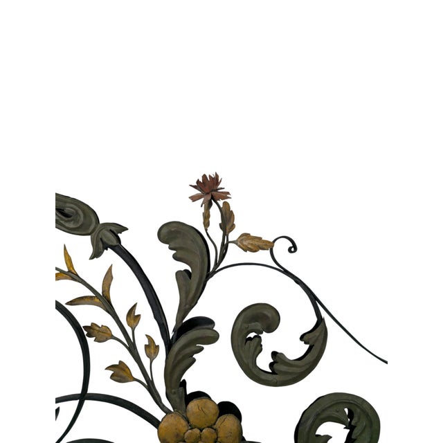Historic wrought-iron wall bracket (Ausleger), of the kind used as a tavern or trade sign. The arm is forged in open...