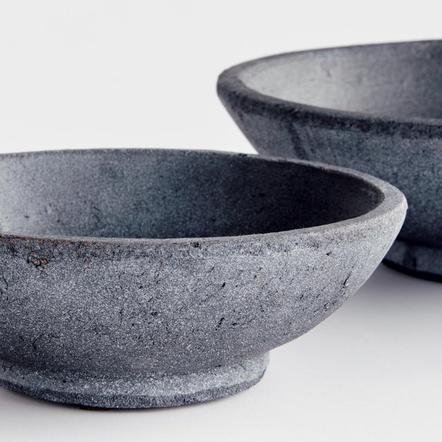 These roughhewn decorative terracotta bowls really bring the drama. The handrubbed finish and intentionally rough surface...