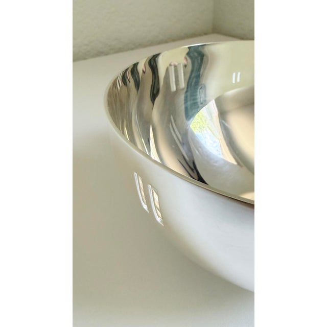 We present this stunning vintage postmodern silver-plated "Skyscraper" bowl, produced by Swid Powell and designed by the...