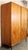 A sleek mid-century armoire by A.H. McIntosh (1960s, Scotland), crafted in warm teak veneer. With minimalist lines, subtle...