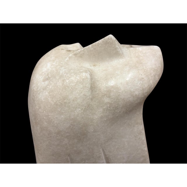 In the Erte style. A large and heavy 24” tall art deco bust of a woman. A wonderful stylized example. Unsigned but well...