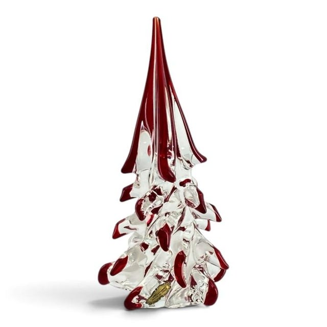 Brilliant Murano (Italy) handcrafted art glass Christmas tree sculpture featuring a It features a clear, solid glass body...