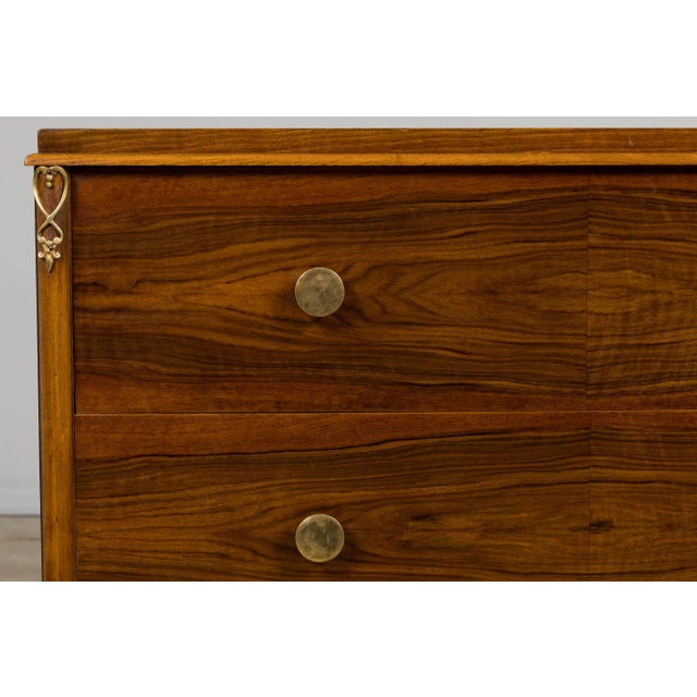 French Art Deco walnut chest of drawers, dating to the 1930s and sourced in Provence, France. The rectangular form...