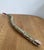 Add a bold statement piece to your decor with this whimsical, hand-carved wooden folk art snake. Featuring an intricate,...