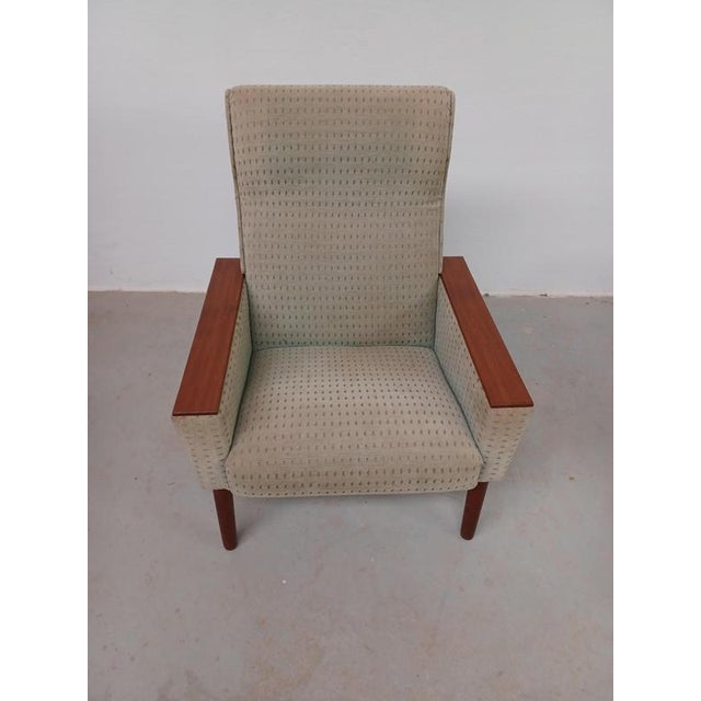 1960s Danish mid-century lounge chair with teak armrests Comfortable 1960s lounge chairs with a typical 1960's look. The...