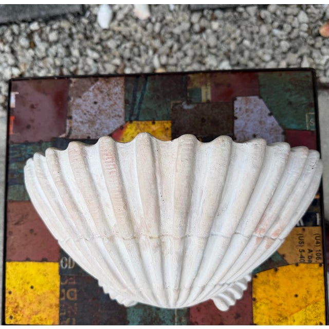 Vintage shell-form wall planter produced by Howard J. Calderone for Studio 45. Featuring a faux stone finish and dramatic...