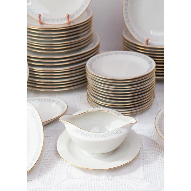 Collaboration between the German firm Hutschenreuther and the Swedish firm Hackefors, as shown on the die. The set...