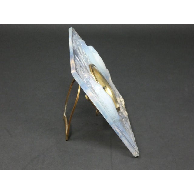 Rene Lalique Clear & Opalescent Glass 'Inseparables' Clock. This design features two pairs of parakeets, perched on...