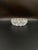 A decorative bowl from the communist era, crafted from high-quality crystal glass. The bowl features a rich, hand-cut...