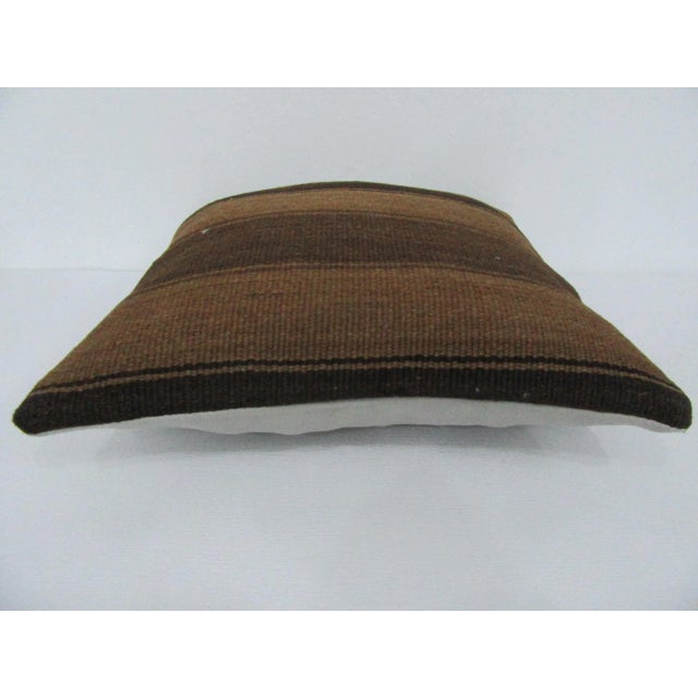 Handmade decorative pillow cover made from a vintage Turkish kilim rug. Backed with good quality cotton fabric. Pillow...